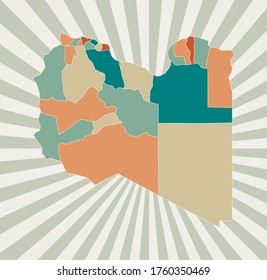 Libya map. Poster with map of the country in retro color palette. Shape of Libya with sunburst rays background. Vector illustration.