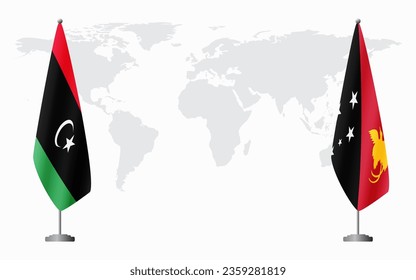 Libya and Papua New Guinea flags for official meeting against background of world map.