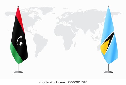 Libyen und St. Lucia Flaggen für offizielle Treffen auf dem Hintergrund der Weltkarte.