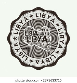 Libya seal. Country round logo with shape of Libya and country name in multiple languages word cloud. Astonishing emblem. Radiant vector illustration.