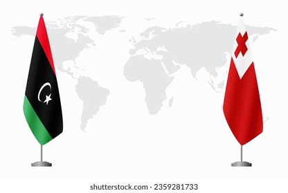Libya and Tonga flags for official meeting against background of world map.