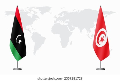 Libya and Tunisia flags for official meeting against background of world map.