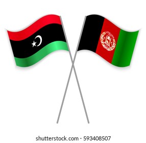Libyan and Afghan crossed flags. Libya combined with Afghanistan isolated on white. Language learning, international business or travel concept.