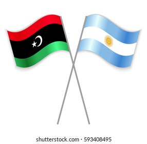 Libyan and Argentine crossed flags. Libya combined with Argentina isolated on white. Language learning, international business or travel concept.