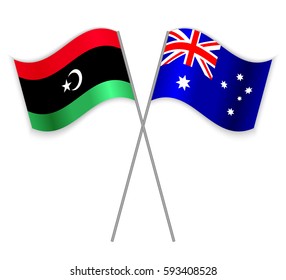 Libyan and Australian crossed flags. Libya combined with Australia isolated on white. Language learning, international business or travel concept.