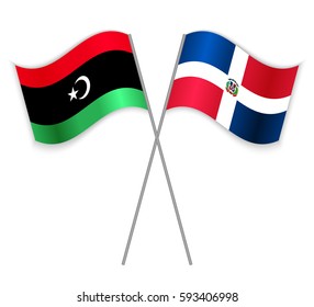 Libyan and Dominican crossed flags. Libya combined with Dominican Republic isolated on white. Language learning, international business or travel concept.