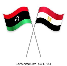 Libyan and Egyptian crossed flags. Libya combined with Egypt isolated on white. Language learning, international business or travel concept.