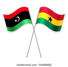 Libyan and Ghanaian crossed flags. Libya combined with Ghana isolated on white. Language learning, international business or travel concept.