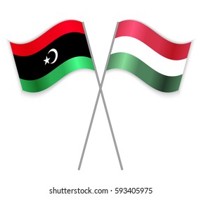 Libyan and Hungarian crossed flags. Libya combined with Hungary isolated on white. Language learning, international business or travel concept.