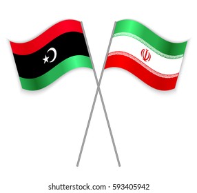 Libyan and Iranian crossed flags. Libya combined with Iran isolated on white. Language learning, international business or travel concept.