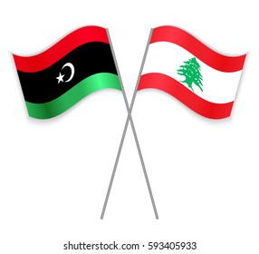 Libyan and Lebanese crossed flags. Libya combined with Lebanon isolated on white. Language learning, international business or travel concept.
