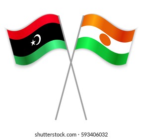 Libyan and Nigerien crossed flags. Libya combined with Niger isolated on white. Language learning, international business or travel concept.