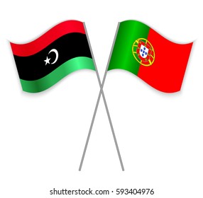 Libyan and Portuguese crossed flags. Libya combined with Portugal isolated on white. Language learning, international business or travel concept.