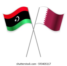Libyan and Qatari crossed flags. Libya combined with Qatar isolated on white. Language learning, international business or travel concept.