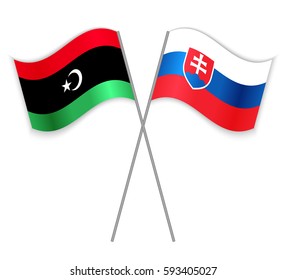 Libyan and Slovak crossed flags. Libya combined with Slovakia isolated on white. Language learning, international business or travel concept.
