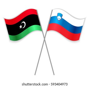 Libyan and Slovenian crossed flags. Libya combined with Slovenia isolated on white. Language learning, international business or travel concept.