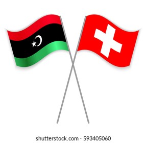Libyan and Swiss crossed flags. Libya combined with Switzerland isolated on white. Language learning, international business or travel concept.