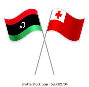 Libyan and Tongan crossed flags. Libya combined with Tonga isolated on white. Language learning, international business or travel concept.