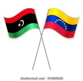 Libyan and Venezuelan crossed flags. Libya combined with Venezuela isolated on white. Language learning, international business or travel concept.