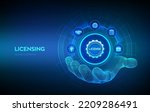 Licensing icon in robotic hand. License agreement. Copyright protection law license property rights. Business technology concept. Vector illustration.