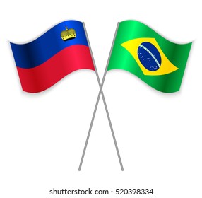 Liechtenstein and Brazilian crossed flags. Liechtenstein combined with Brazil isolated on white. Language learning, international business or travel concept.