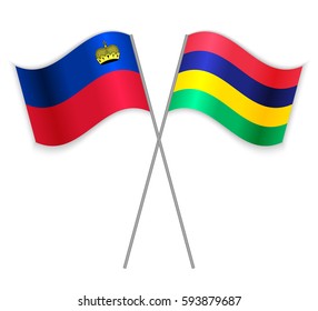 Liechtenstein and Mauritian crossed flags. Liechtenstein combined with Mauritius isolated on white. Language learning, international business or travel concept.