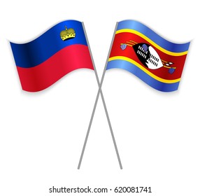 Liechtenstein and Swazi crossed flags. Liechtenstein combined with Swaziland isolated on white. Language learning, international business or travel concept.