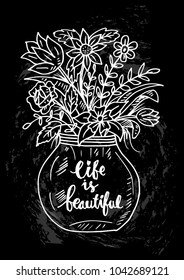 Life is beautiful lettering in a vase