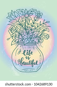 Life is beautiful lettering in a vase