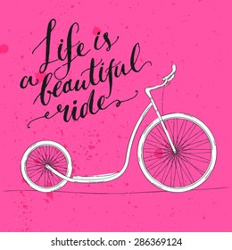 Life is a beautiful ride - modern Handwritten modern calligraphy, inspirational quote for card on pink background with kick bike