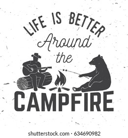 Life is better around the campfire. Vector illustration. Concept for shirt or logo, print, stamp or tee. Vintage typography design with campfire, bear, man with guitar and forest silhouette.
