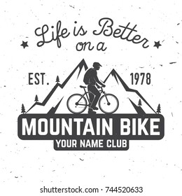 Life is better on a mountain bike. Vector illustration. Concept for shirt or logo, print, stamp or tee. Vintage typography design with man riding bike and mountain silhouette. Outdoor adventure.