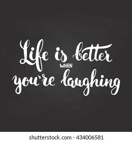 Life is better when you're laughing - hand drawn lettering phrase isolated on the chalkboard background. Fun brush ink inscription for photo overlays, greeting card or t-shirt print, poster design.