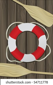 Life Buoy and two Boat Oars on a deck background.