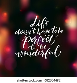 Life doesn't have to be perfect to be wonderful. Inspirational quote, brush lettering on dark background with pink bokeh