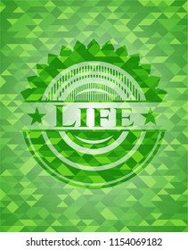 Life green emblem with triangle mosaic background