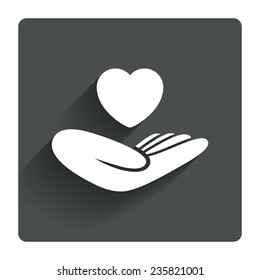 Life insurance sign. Hand holds human heart symbol. Health insurance. Gray flat square button with shadow. Modern UI website navigation. Vector