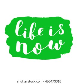 Life is now. Brush hand lettering. Inspiring quote on stain background. Motivating modern calligraphy. Can be used for photo overlays, posters, clothes, cards and more.