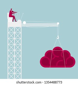 Lifting brain through the tower crane. Businessman driving a tower crane.