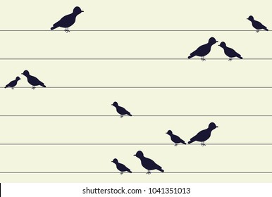 Light backdrop with birds sitting on wires