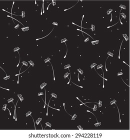 Light black and white seamless pattern with the image of flying dandelion on a black background