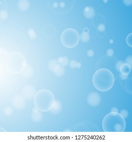 Light blue abstract background with a bokeh in the form of circles. Underwater world with air bubbles. Vector illustration