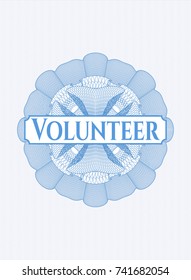 Light blue abstract rosette with text Volunteer inside