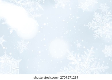 Light blue background with snowflakes. The background is soft and wintry, featuring a delicate light blue color and frosty texture. Winter background with copy space vector.