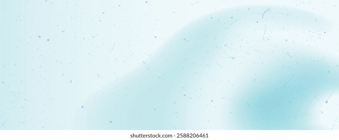 A light blue background with a soft, smooth texture. The background features a subtle gradient with blue speckles throughout. Gradient patterned background vector. Blue background.