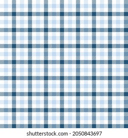 Light blue and dark blue checkered plaid. Tattersall pattern fabric swatch.