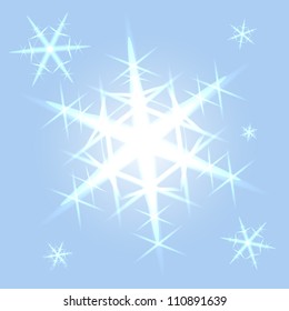 Light blue festive background with big crystal snowflakes falling deliberately