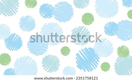 Light blue and green hand-drawn crayon touch graffiti circle polka dot background