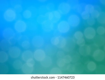 Light Blue, Green vector bokeh and colorful pattern. A vague abstract illustration with gradient. The background for your creative designs.