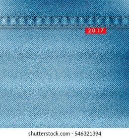 Light blue jeans texture. Denim background with red label and text 2017. Pattern can be used for wallpaper, pattern fills, web page background, surface textures. Denim texture